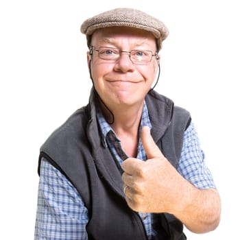 Expressive old man giving thumbs up isolated against white background.