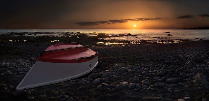 Fishing boat in sunset