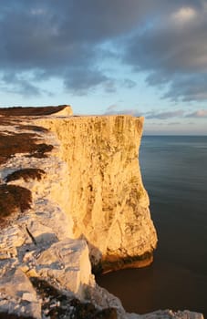 chalk cliff in sussex. English landmark, seven sisters hills by the sea in seaford. beach in spring and sunset