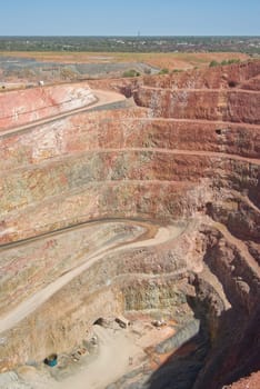 very deep mine with layers in the rock strata