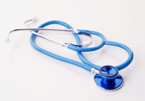 great image of a blue stethoscope on white