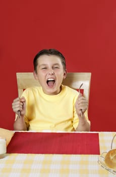 Hungry boy screaming for his lunch or dinner