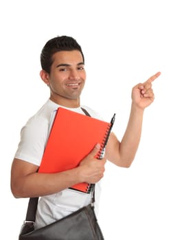 Handsome male university or college student points his finger to your message or slogan