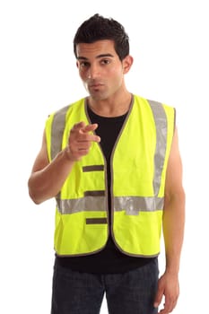 A construction worker, repairman, tradesman wearing safety vest is pointing his finger.