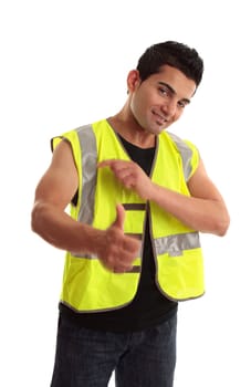 Cool young tradesman, construction worker or handyman gesturing thumbs up, approval, great job, success, etc.  Motion in hands