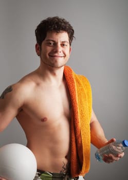Smiling young man ready for beach entertainment