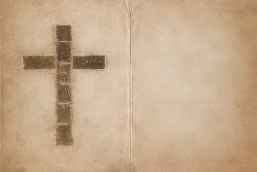 great image of a christian cross in old book