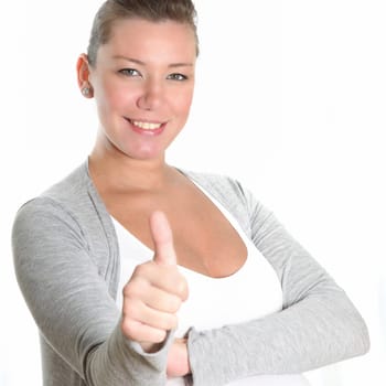 smiling young woman showing thumbs up