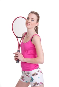 pretty young woman ready to play tennis isolated on white