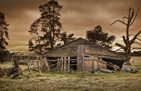 old farm building all forgotten and falling down