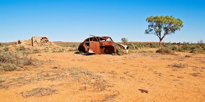 excellent image of an old car in the desert