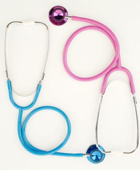 great image of pink and blue stethoscopes