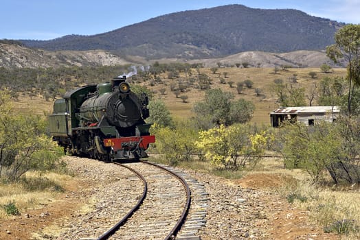 steam train coming around the corner