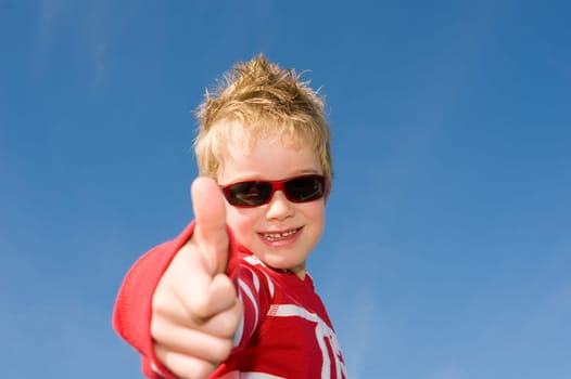 boy with thumb up