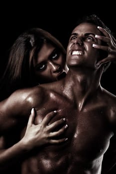 Concept for painful sin. Young woman catching and possessing a young man in her spell