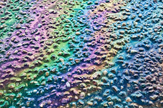 Fuel puddle on the asphalt