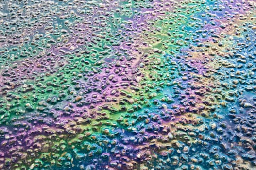 Fuel puddle on the asphalt