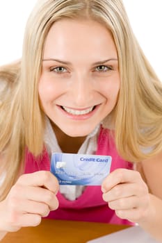 Home shopping - young woman holding credit card on white background