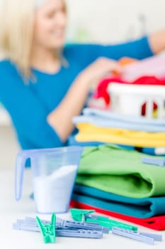 Laundry clothespin - woman in background folding clothes