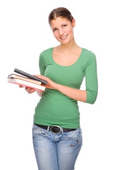 Studio shot of a young student with books