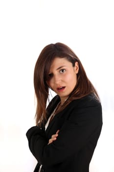 Surprised business woman with crossed arms looking at camera