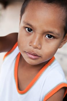 Young Asian boy portrait - Filipino child from impoverished area in the Philippines