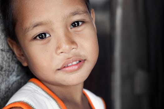 Young Asian boy portrait - Filipino child from impoverished area in the Philippines