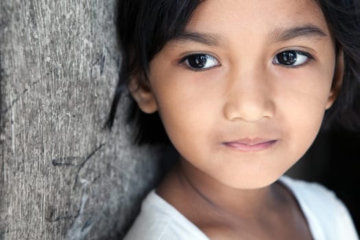 Asian girl portrait - looking to side. Manila, Philippines.