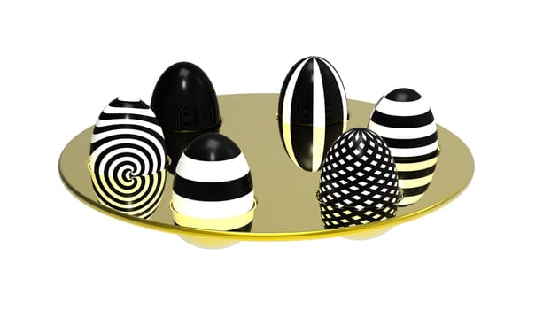 Black and white eggs on golden plate