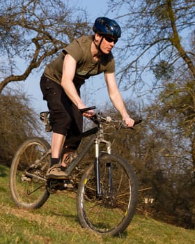 Maountainbiker on a dirt road