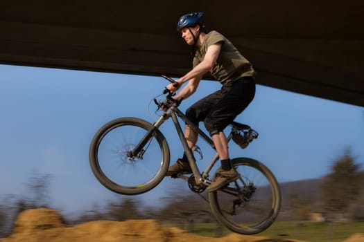 Jumping mountain biker