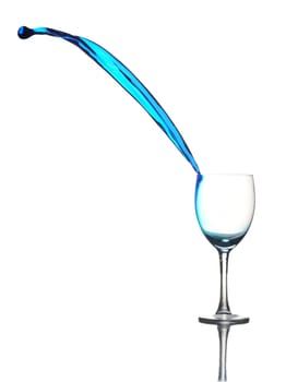 Colored liquid splashing out on a white background