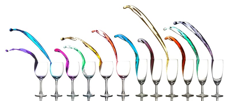 Colored liquid splashing out on a white background
