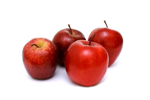 Fresh red apples isolated on white background