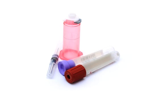 Test tubes and vacutainer isolated on white