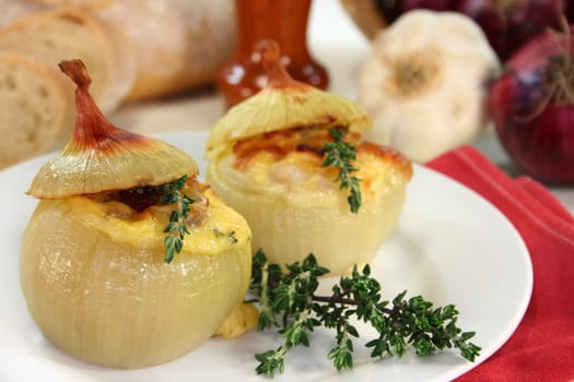 Onion stuffed with goat cheese and bacon