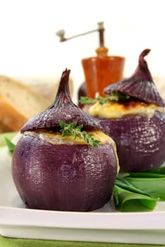 Onion stuffed with goat cheese and bacon