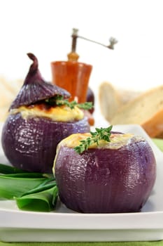 Onion stuffed with goat cheese and bacon