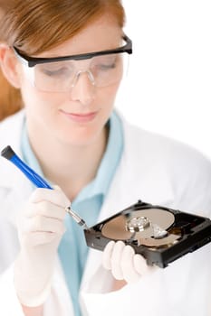 Female computer engineer - IT woman repair hard disc defect