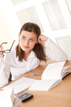 Young brown hair student studying home