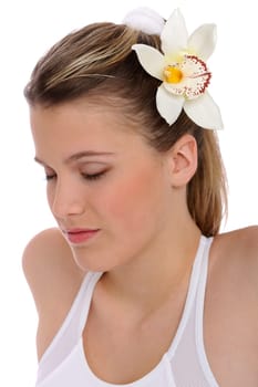 Fitness - Young woman in yoga position on white background relaxing