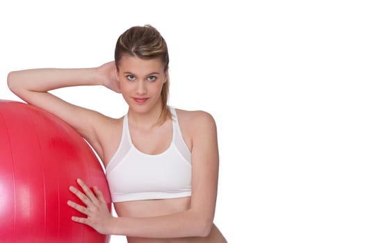 Fitness - Young happy woman with exercise ball on white background