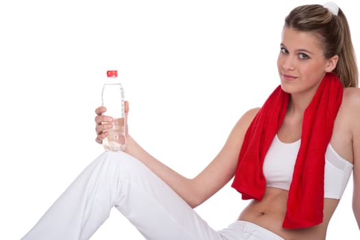 Fitness - Young sportive woman with water and towel on white background