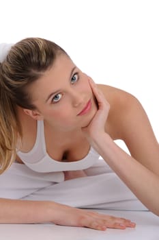 Fitness - young sportive woman on white wearing fitness clothes