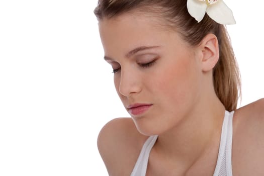 Fitness - Young woman in yoga position on white background relaxing