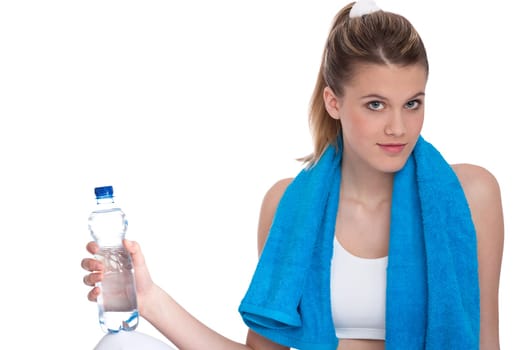 Fitness - Young sportive woman with water and towel on white background