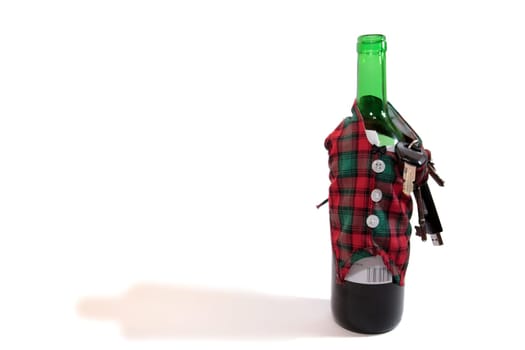 bottle dressed in jacket warmer with keys and alcohol on white background depicting drunk driving and addictions can kill