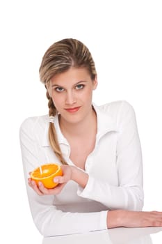 Woman holding orange on white background