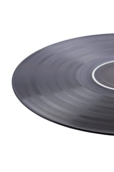 Dusty vinyl record with black label isolated on white background. Focus at front an very shallow depth of field