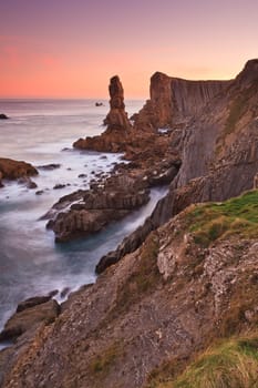 Amazing seascape sunrise at winter. Los Urros, Spain